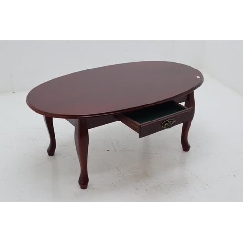 462 - Mid Century Dark Wood Oval Coffee table Sitting on Queen Ann legs with Green Velvet Lined Under draw... 