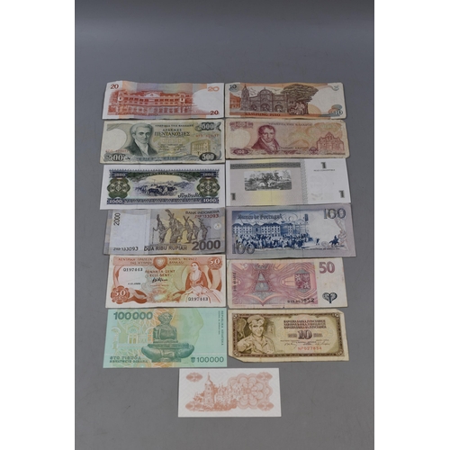 201 - Selection of 12 Mixed Worldwide Bank Notes