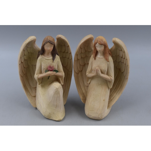 257 - Pair of Guardian Angels one in Prayer one Holding A Rose both approx 6