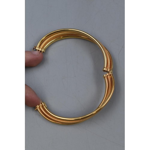 12 - Gold 375 (9ct) Twisted Bangle with Safety Catch Fitted in Gift Box