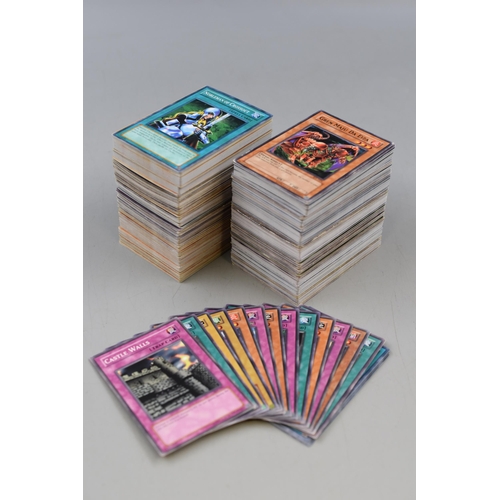 338 - Large Selection of Yu-Gi-Oh trading Cards, storage tin, Rulebook and Deck Zone including magic Card,... 