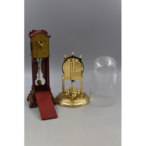 180 - Miniature Working Grandfather Clock Measuring Approx 31cm and a Glass Domed Anniversary Clock. Both ... 