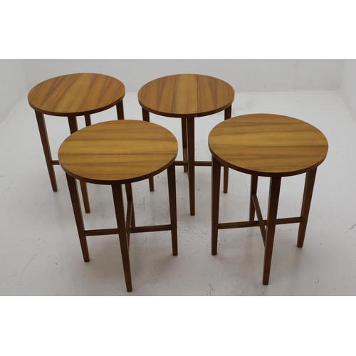 422 - A Retro Nest of Five Tables on Castors. Approx 42cm x 62cm x 57.5cm.