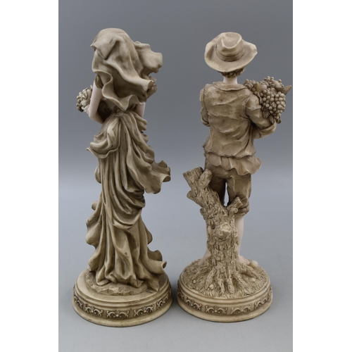 202 - Pair of  Male and Female Figurines Depicting gathering Fruit both approx 12