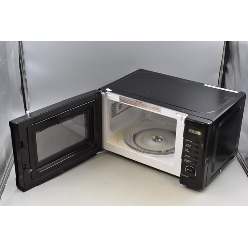 480 - Black Microwave Oven 700 Watt. Powers on