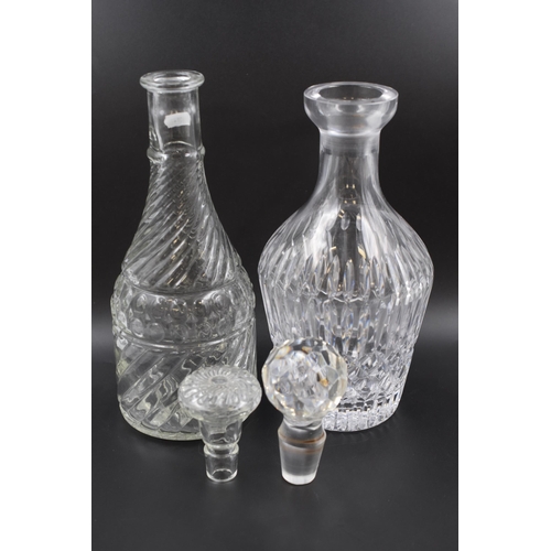 589 - A Mixed Selection of Glassware, To Include Assorted Glass Bowls and Two Decanters With Stoppers.