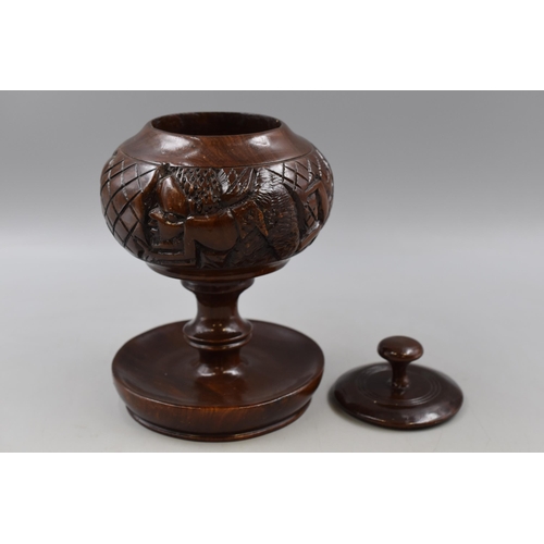 347 - Intricately Carved Wooden African Jar with lid and Raised Rim Base approx. 26cm