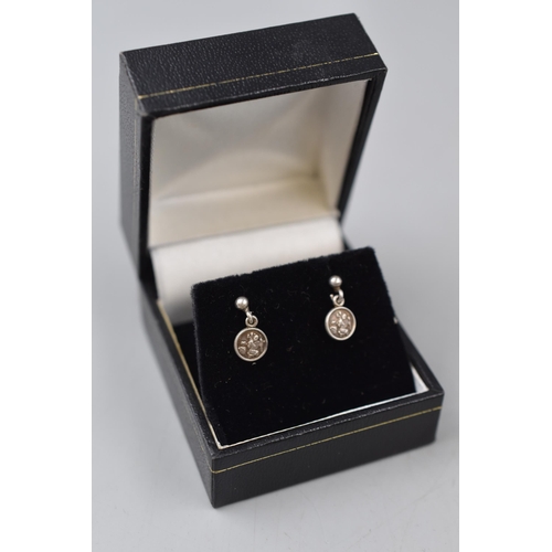 64 - Three Boxed Pairs of Sterling Silver Earrings and a Boxed Silver 925 CZ Pendant