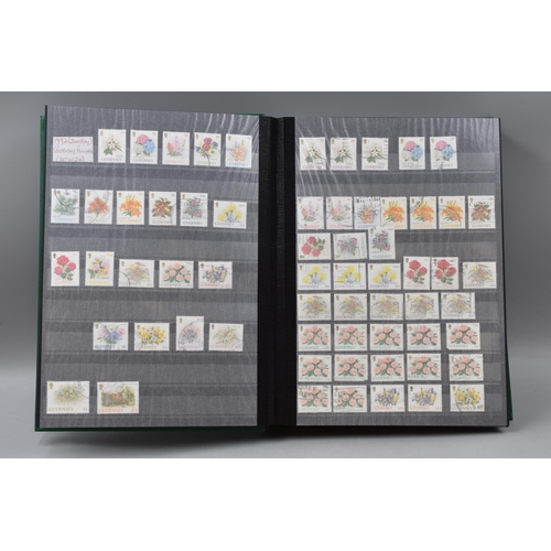 483 - Two Stock Albums Containing a selection of Guernsey definitives, commemoratives and special stamps