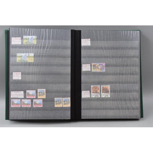 483 - Two Stock Albums Containing a selection of Guernsey definitives, commemoratives and special stamps