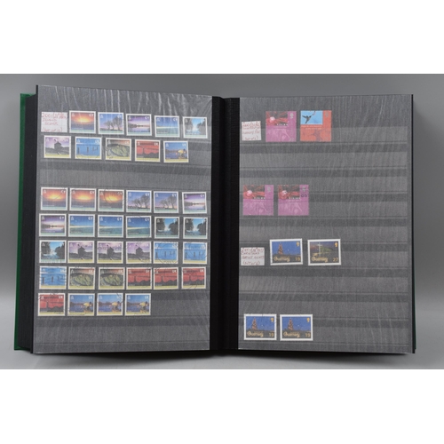 483 - Two Stock Albums Containing a selection of Guernsey definitives, commemoratives and special stamps