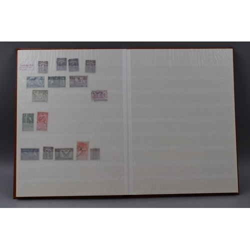 483 - Two Stock Albums Containing a selection of Guernsey definitives, commemoratives and special stamps