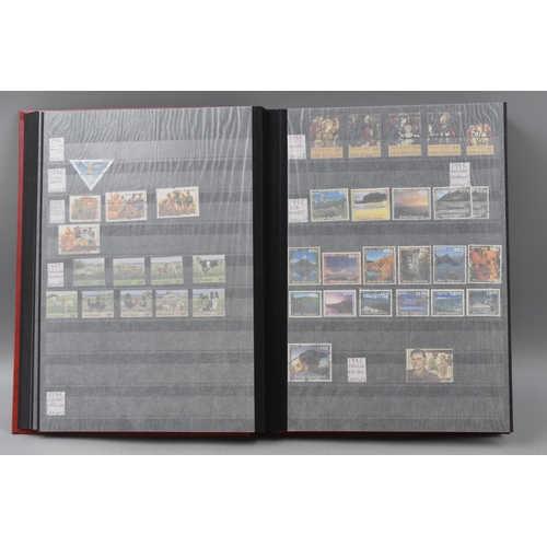 485 - Three Stock Albums containing New Zealand definitives, commemoratives and special stamps