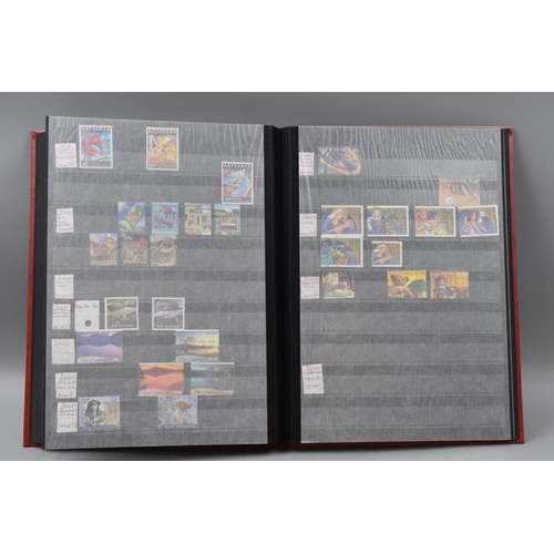 485 - Three Stock Albums containing New Zealand definitives, commemoratives and special stamps