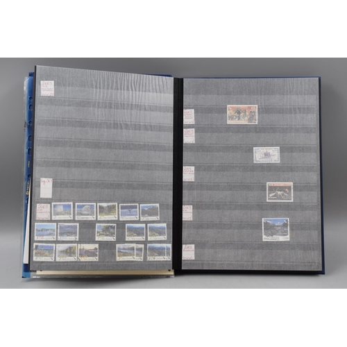 485 - Three Stock Albums containing New Zealand definitives, commemoratives and special stamps