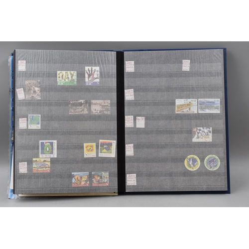 485 - Three Stock Albums containing New Zealand definitives, commemoratives and special stamps