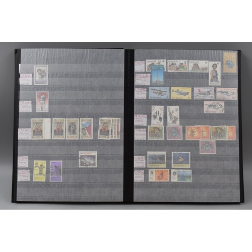 485 - Three Stock Albums containing New Zealand definitives, commemoratives and special stamps