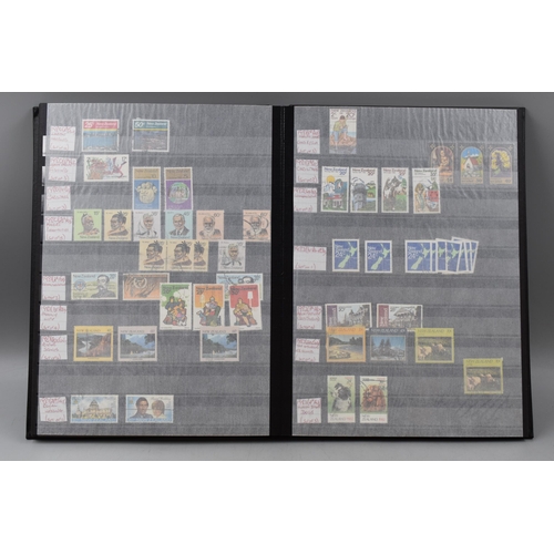 485 - Three Stock Albums containing New Zealand definitives, commemoratives and special stamps