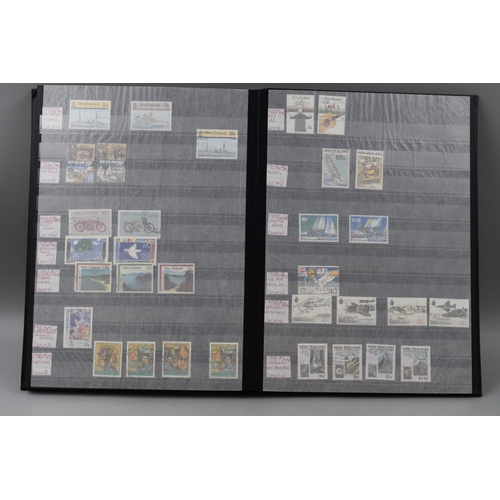 485 - Three Stock Albums containing New Zealand definitives, commemoratives and special stamps