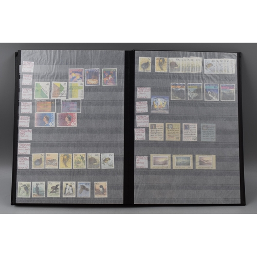 485 - Three Stock Albums containing New Zealand definitives, commemoratives and special stamps