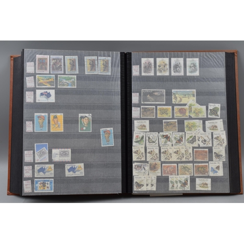 486 - Stock Book Containing a selection of Australian definitives, commemoratives and special stamps datin... 