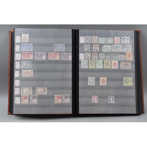 486 - Stock Book Containing a selection of Australian definitives, commemoratives and special stamps datin... 