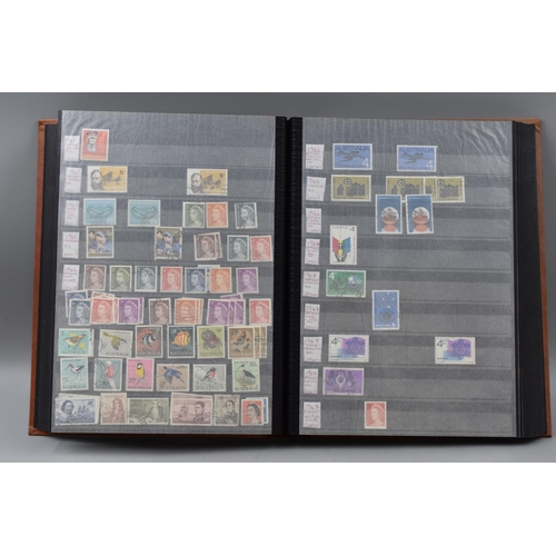 486 - Stock Book Containing a selection of Australian definitives, commemoratives and special stamps datin... 