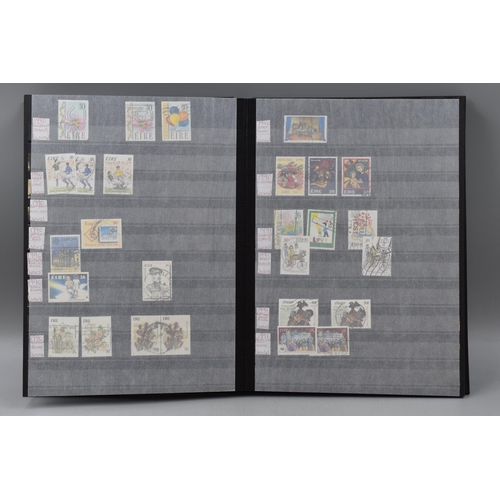 487 - Three Stock Books Containing a Large selection of Irish Stamps Dating From 1983 to Present