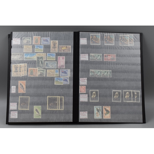 488 - Stock Book Containing New Zealand definitives, commemoratives and special stamps dating from 1855 to... 