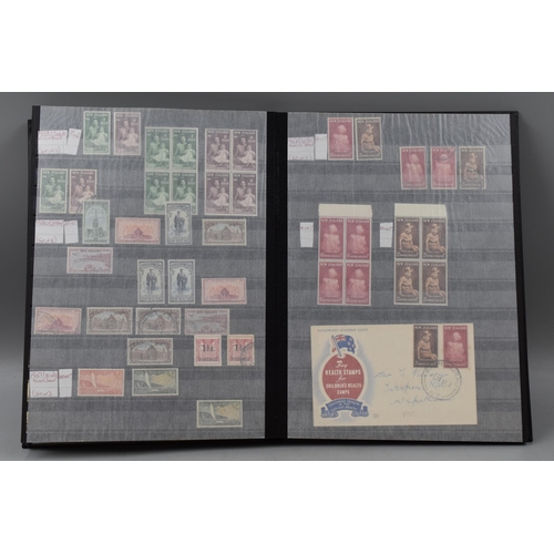 488 - Stock Book Containing New Zealand definitives, commemoratives and special stamps dating from 1855 to... 