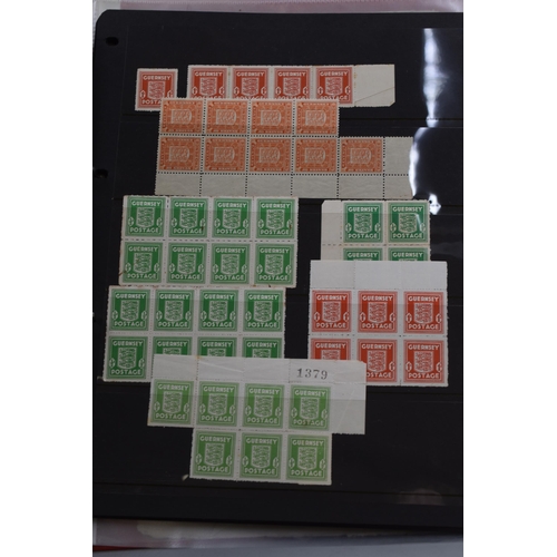 505 - Two Albums Containing Guernsey Mint and mixed Isle of Man Stamps