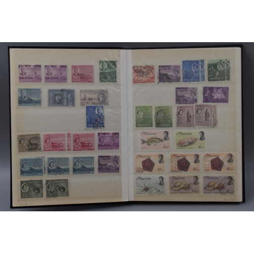 509 - Three Stock Albums Containing Stamps From South Africa, Monaco, and Cyprus