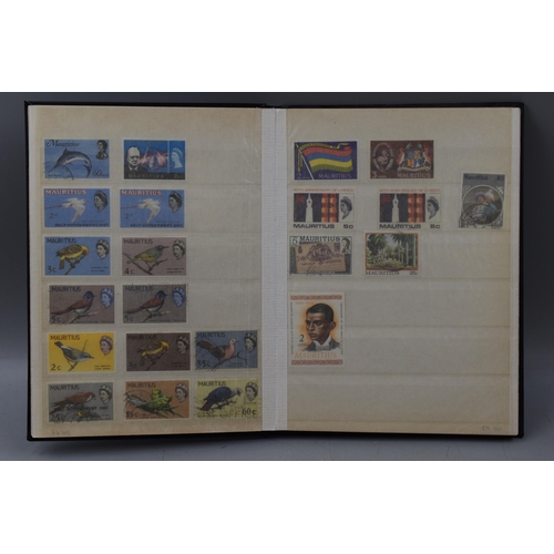 509 - Three Stock Albums Containing Stamps From South Africa, Monaco, and Cyprus