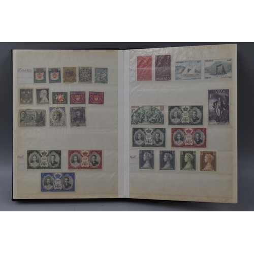 509 - Three Stock Albums Containing Stamps From South Africa, Monaco, and Cyprus