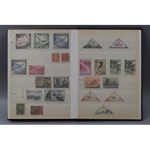 509 - Three Stock Albums Containing Stamps From South Africa, Monaco, and Cyprus