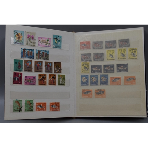 510 - Two Stock Albums Containing a Selection of Commonwealth Stamps  including Malaya, North Borneo, Gibr... 