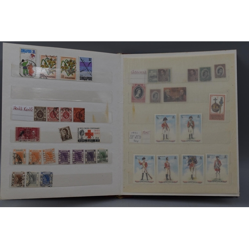 510 - Two Stock Albums Containing a Selection of Commonwealth Stamps  including Malaya, North Borneo, Gibr... 