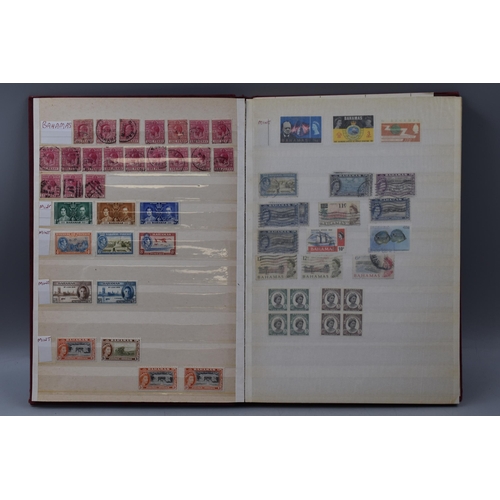 511 - Three Stock Albums Containing a Large Selection of Commonwealth Stamps including Gold Coast, Grenada... 