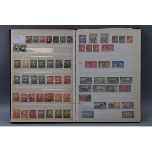 511 - Three Stock Albums Containing a Large Selection of Commonwealth Stamps including Gold Coast, Grenada... 