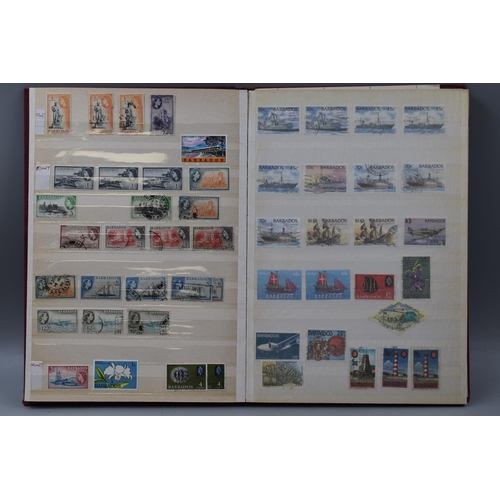 511 - Three Stock Albums Containing a Large Selection of Commonwealth Stamps including Gold Coast, Grenada... 