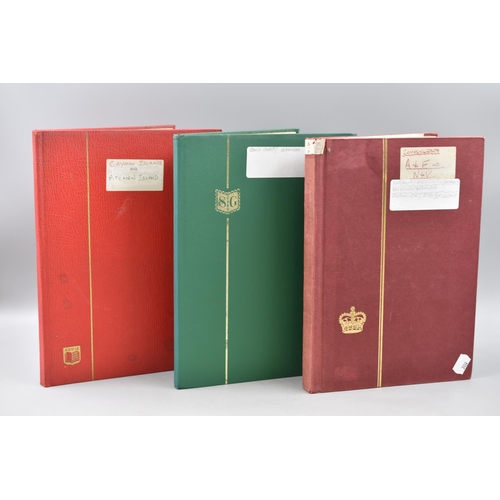 511 - Three Stock Albums Containing a Large Selection of Commonwealth Stamps including Gold Coast, Grenada... 