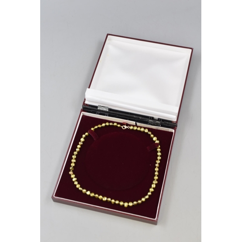 199 - Sterling Silver Clasped Gold Bead Necklace in Presentation Box