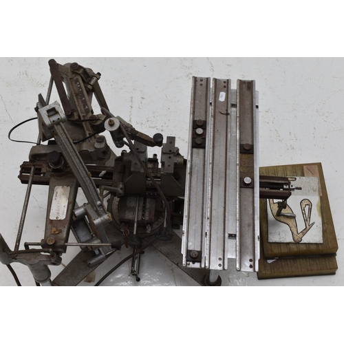 606 - Gravograph professional engraving machine with a selection of stencils Powers on but untested. Sold ... 