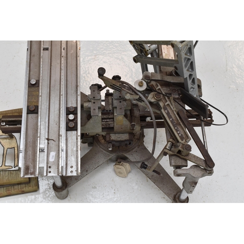 606 - Gravograph professional engraving machine with a selection of stencils Powers on but untested. Sold ... 