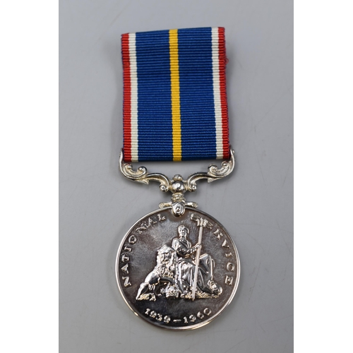 253 - Boxed national Service Medal 1939-1960 complete with Spare Ribbon and Medal Service Number Card in o... 