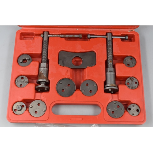 654 - An 18 Piece Brake Caliper Wind Back Tool Kit.