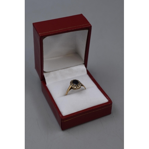 3 - Hallmarked 375 (9ct) Gold Clear and Blue Stoned Ring (Size N) Compmete with Presentation Box