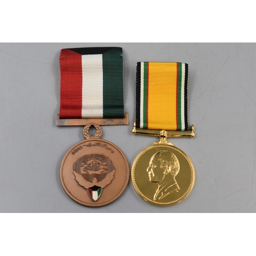 205 - A Gold Plated Jordan Service Medal By Bigbury Mint and A Kuwait Liberation Medal. Both With Ribbons ... 