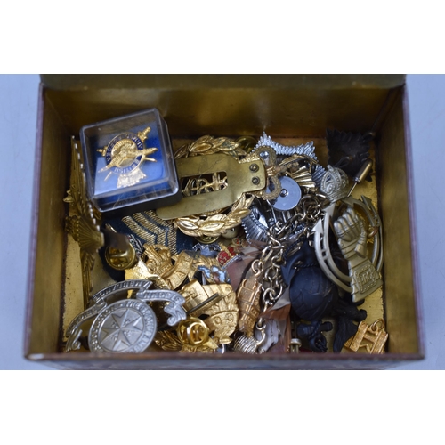 208 - A Vintage Tin Containing a Selection of Military Cap Badges