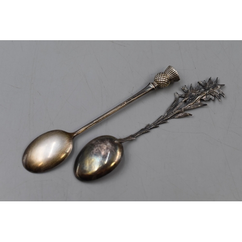 48 - Two Silver Teaspoons. One Hallmarked Birmingham With Scottish Thistle Decoration and The Other 800. ... 